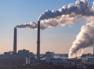 Wind is blowing pollution from a coal burning power plant.